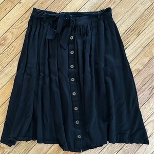 ModCloth black skirt with buttons, waist tie and pockets